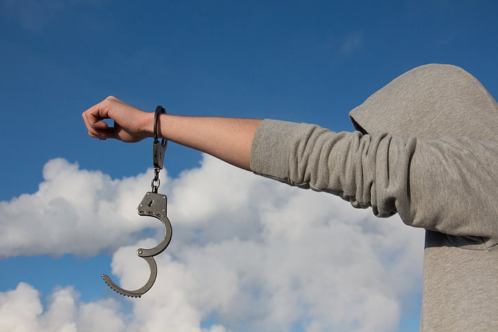 guy free from handcuffs - featured image